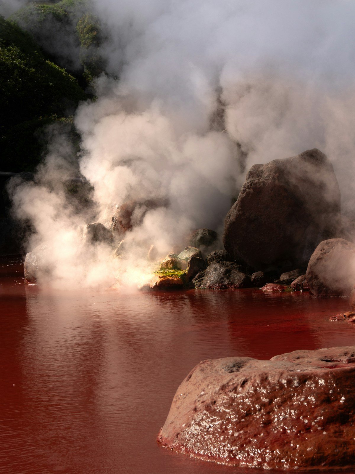 Steaming red hot springs at the Hells of Beppu, Oita, Japan