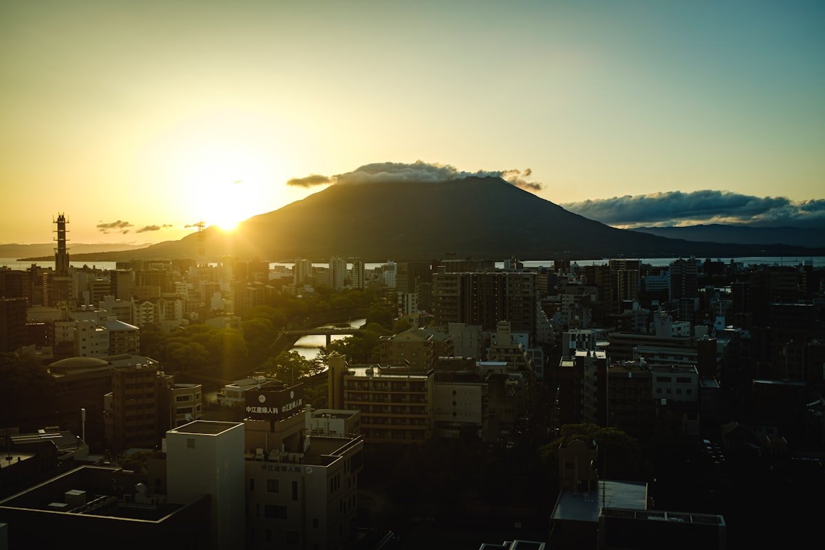 Kagoshima city skyline with Sakurajima volcano at sunrise, Kagoshima Japan