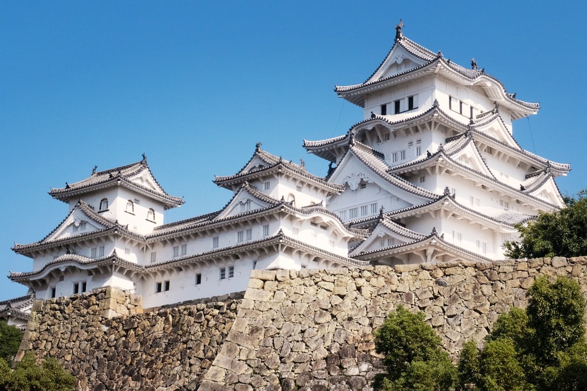 Himeji Castle surrounded by trees in spring, Himeji Hyogo Japan