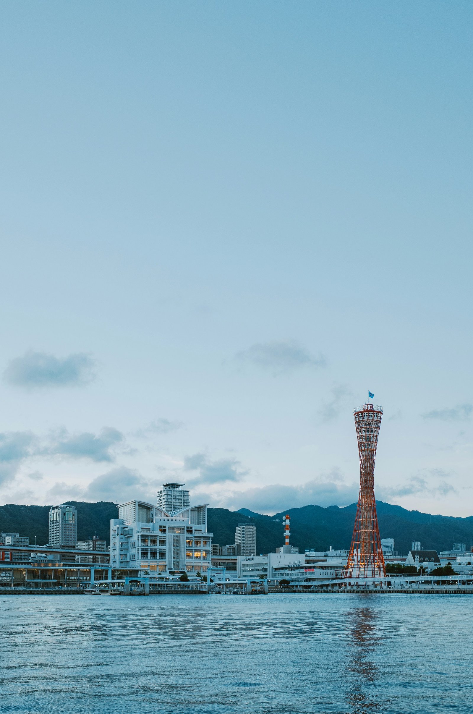Kobe Port Tower reflected in the harbour at dusk
