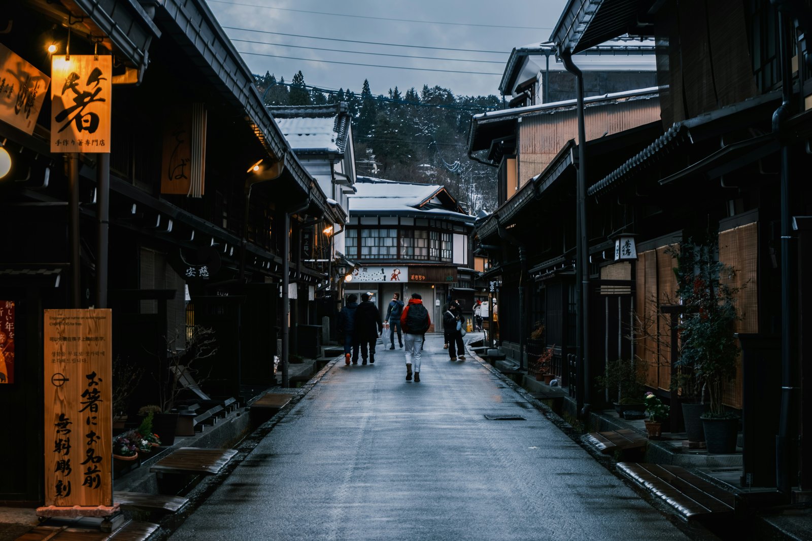 Snowy historic street in Takayama Old Town, Gifu Japan — getting around Takayama