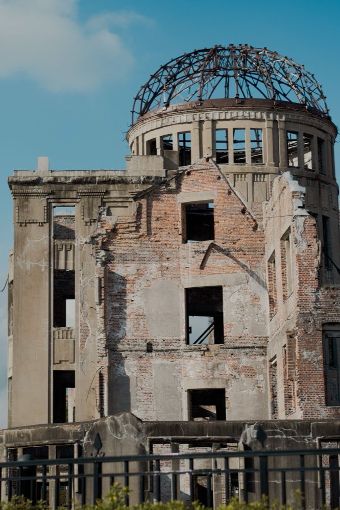 The Atomic Bomb Dome in Hiroshima under a blue sky