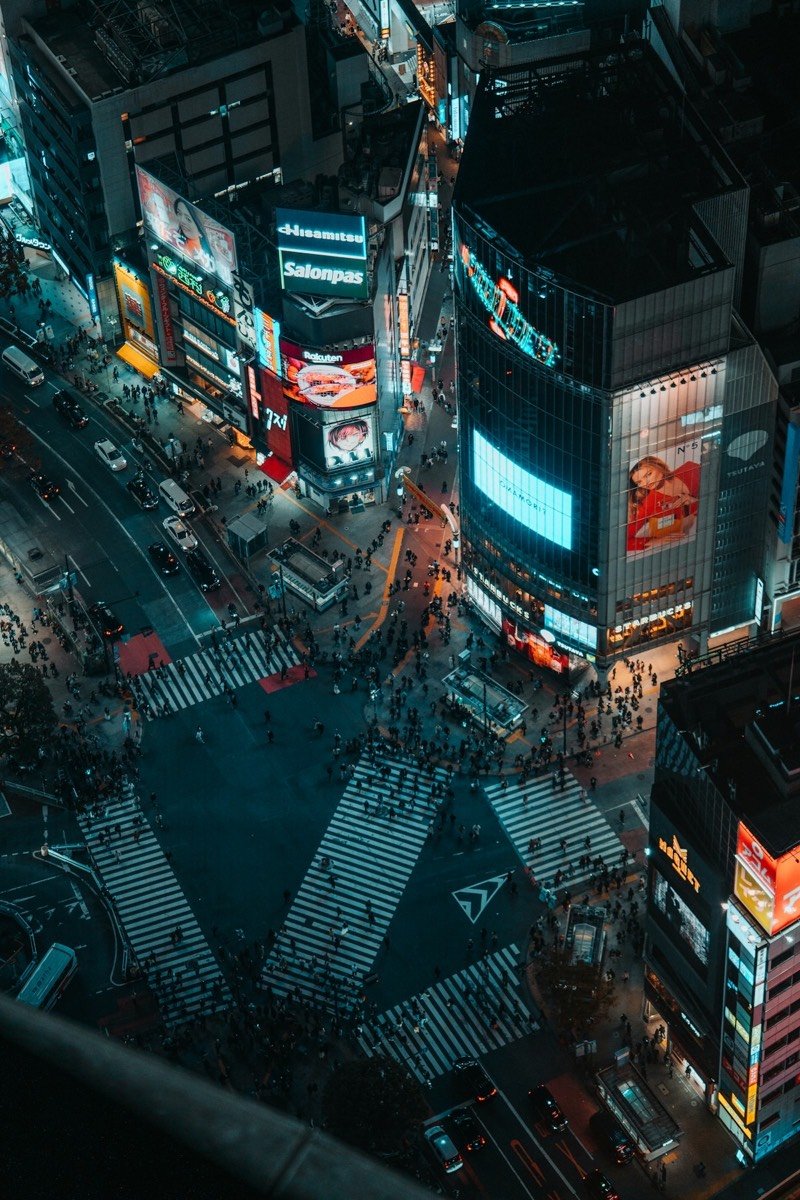 Shibuya crossing at night with neon lights — 3 days in Tokyo itinerary