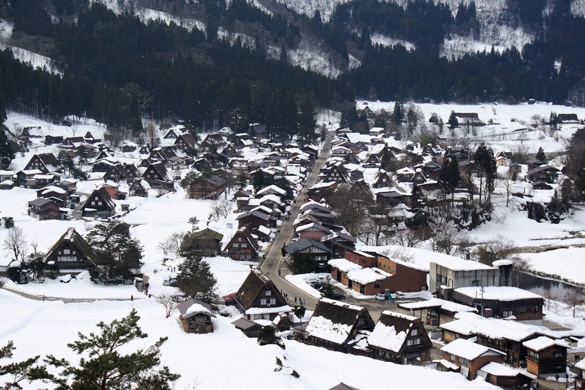 Snow-covered Shirakawa-go village with traditional thatched-roof farmhouses — UNESCO World Heritage Site, Japan