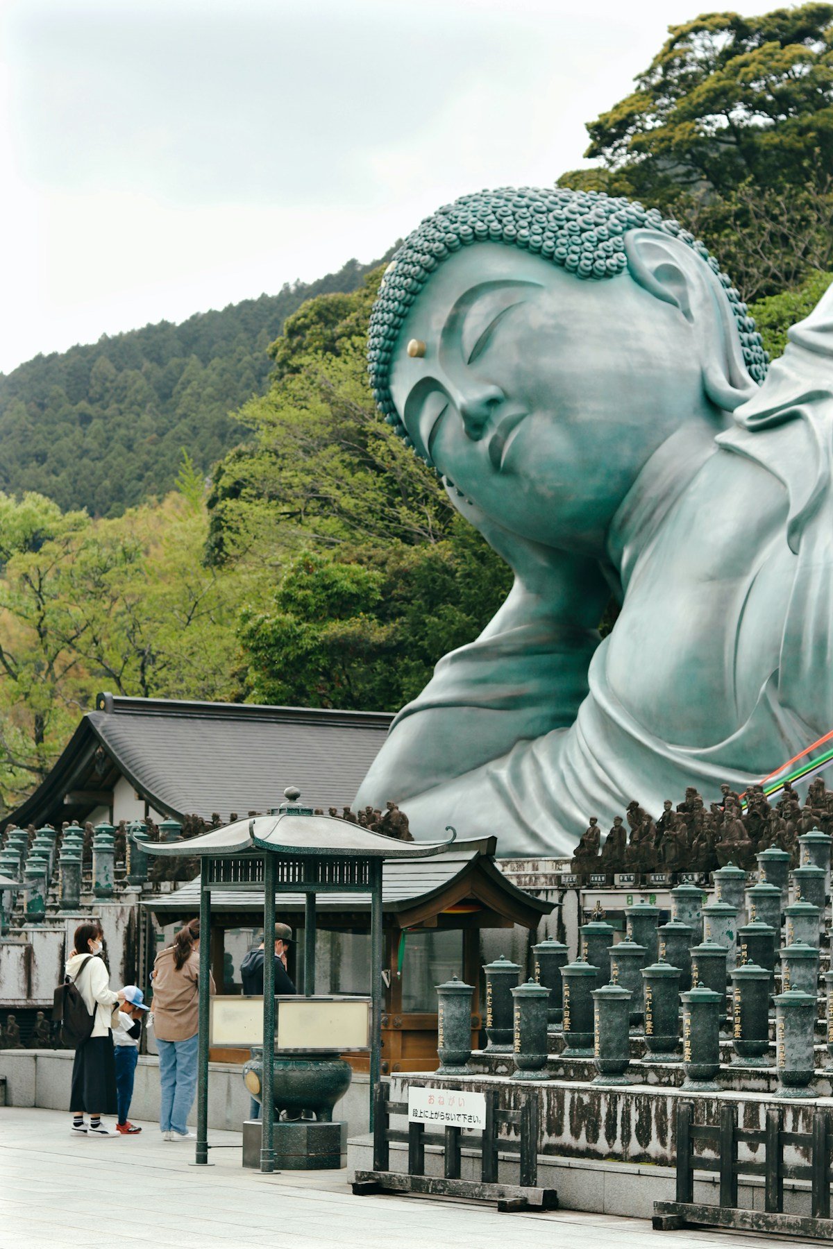 Giant reclining Buddha at Nanzoin Temple, Fukuoka, Japan — Fukuoka vs Osaka comparison