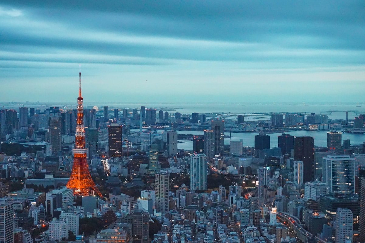 Tokyo Tower at dusk with city skyline — Tokyo vs Kyoto comparison